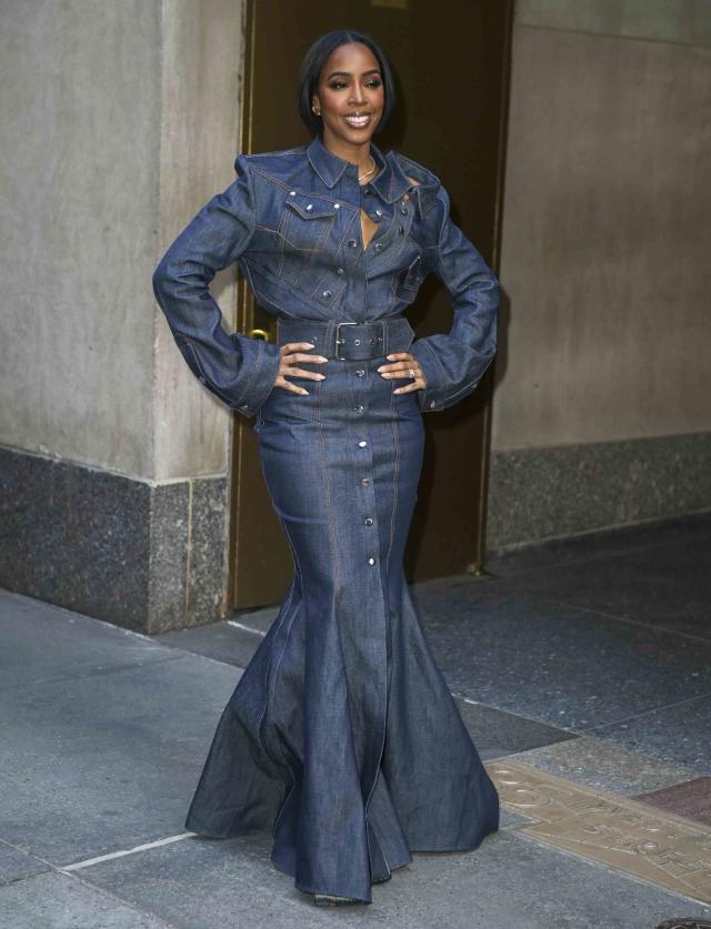 Kelly Rowland shows off her long legs in high waist gold and black shorts  as she hosts BET's Rip the Runway 2013