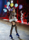 A model presents a creation during the Victoria's Secret Fashion Show in New York November 7, 2012. REUTERS/Carlo Allegri (UNITED STATES - Tags: ENTERTAINMENT FASHION)