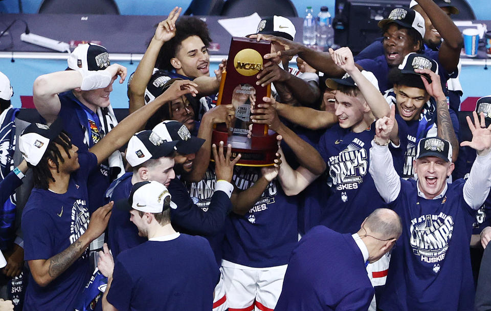 UConn players celebrate after defeating the Purdue in the NCAA championship game at State Farm Stadium on Monday in Glendale, Arizona. (Photo by Tyler Schank/NCAA Photos via Getty Images)
