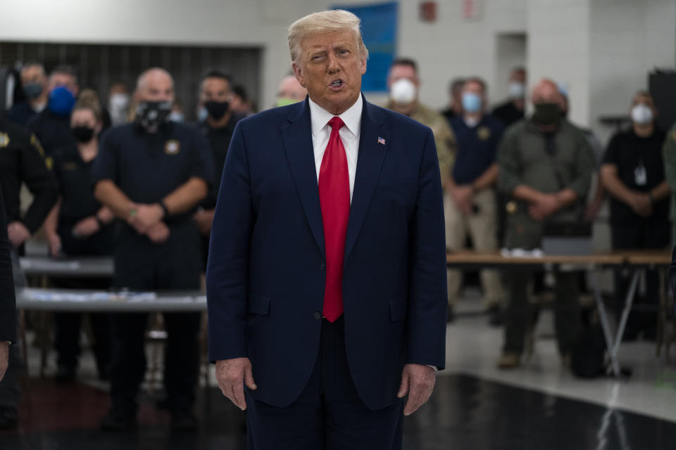 President Donald Trump speaks as he tours an emergency operations center and meets with law enforcement officers at Mary D. Bradford High School, Tuesday, Sept. 1, 2020, in Kenosha, Wis. (AP Photo/Evan Vucci)