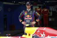 Red Bull Formula One driver Mark Webber of Australia looks on after the qualifying session for the Korean F1 Grand Prix at the Korea International Circuit in Yeongam, October 5, 2013. REUTERS/Kim Hong-Ji (SOUTH KOREA - Tags: SPORT MOTORSPORT F1)