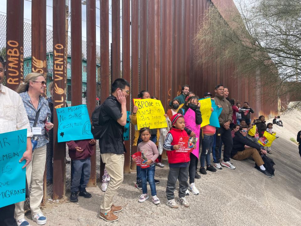 Migrants, advocates and faith leaders gather near the Dennis DeConcini Port of Entry in Nogales, Sonora, to commemorate the third anniversary of Title 42 on Tuesday, March 21, 2023.