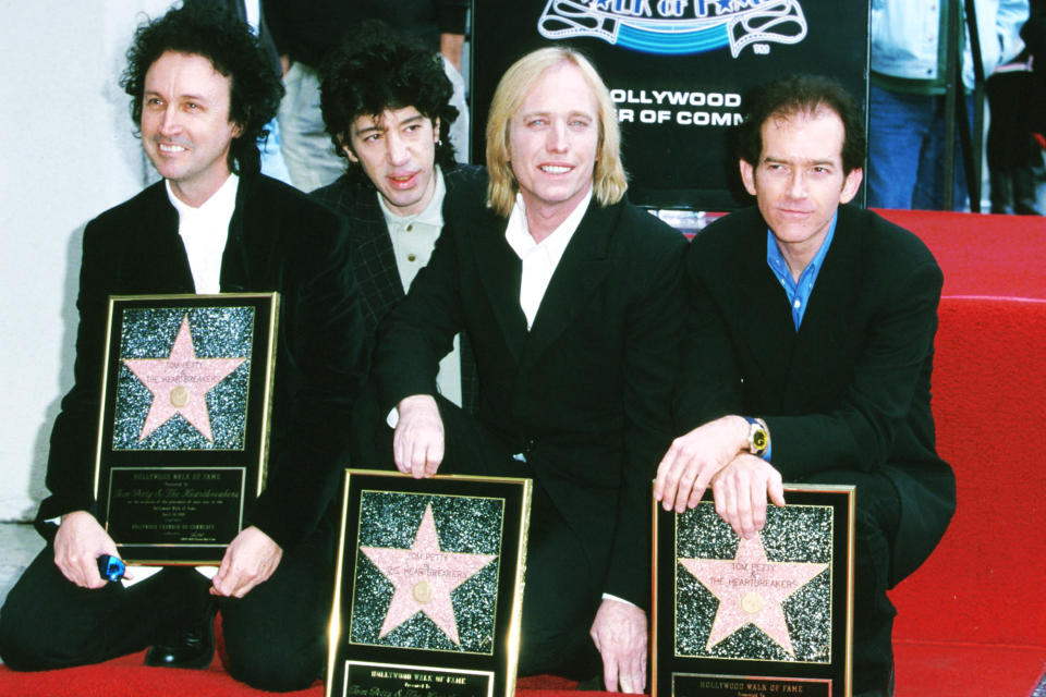 <p>Tom Petty and the Heartbreakers are honored with a star on the Hollywood Walk of Fame on April 28, 1999, in Hollywood. (Photo: S. Granitz/Getty Images) </p>