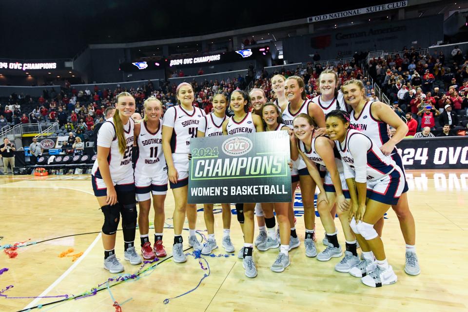 The USI women’s basketball team celebrating after winning the OVC tournament championship.