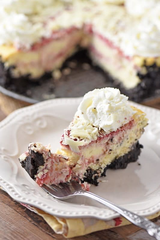 Adventures of Mel<p>Elevate your dinner with a staple dessert: White Chocolate Raspberry Cheesecake, an Olive Garden copycat!</p><p><strong>Get the Recipe: <a href="https://adventuresofmel.com/olive-garden-white-chocolate-raspberry-cheesecake/" rel="sponsored" target="_blank" data-ylk="slk:Olive Garden White Chocolate Raspberry Cheesecake;elm:context_link;itc:0;sec:content-canvas" class="link ">Olive Garden White Chocolate Raspberry Cheesecake</a></strong></p>