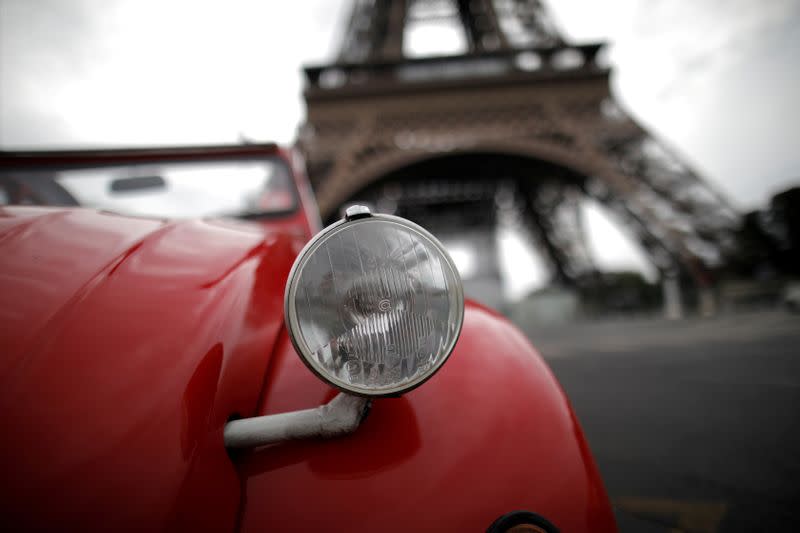 FILE PHOTO: Paris iconic 2CV tours feel brunt of COVID-19 impact on tourism