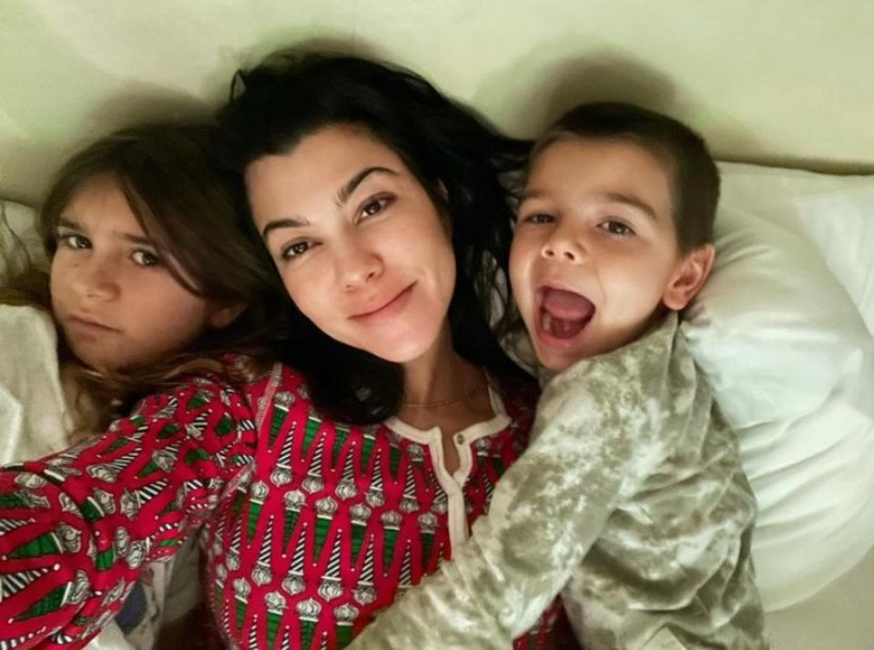 The star with her two of the three children she shares with ex Scott Disick, Penelope (L) and Reign (Instagram / Kourtney Kardashian)