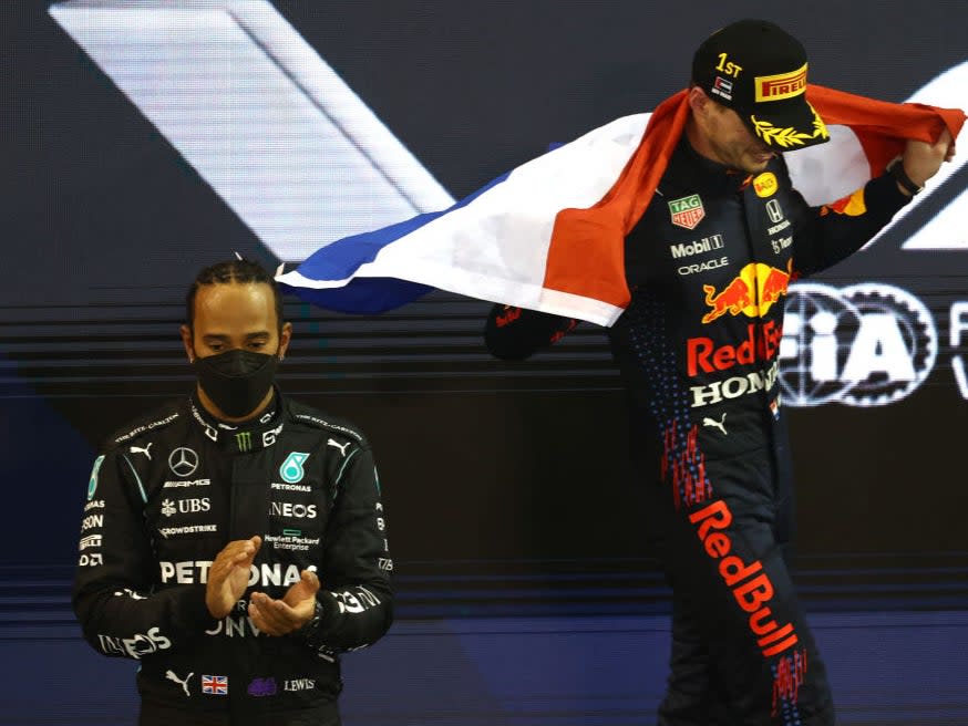 Max Verstappen (right) celebrating his F1 championship win (Getty Images)