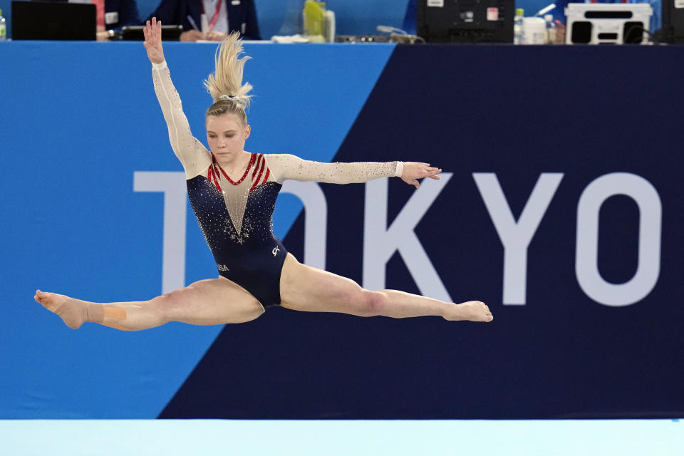 FILE - In this Aug. 2, 2021, file photo, Jade Carey, of the United States, performs on the floor during the artistic gymnastics women's apparatus final at the 2020 Summer Olympics in Tokyo, Japan. Carey is finally embarking on her freshman year at Oregon State, after taking a somewhat winding route to Corvallis. Then again, the 21-year-old Olympic gold medalist is used to taking the non-traditional path. (AP Photo/Gregory Bull, File)