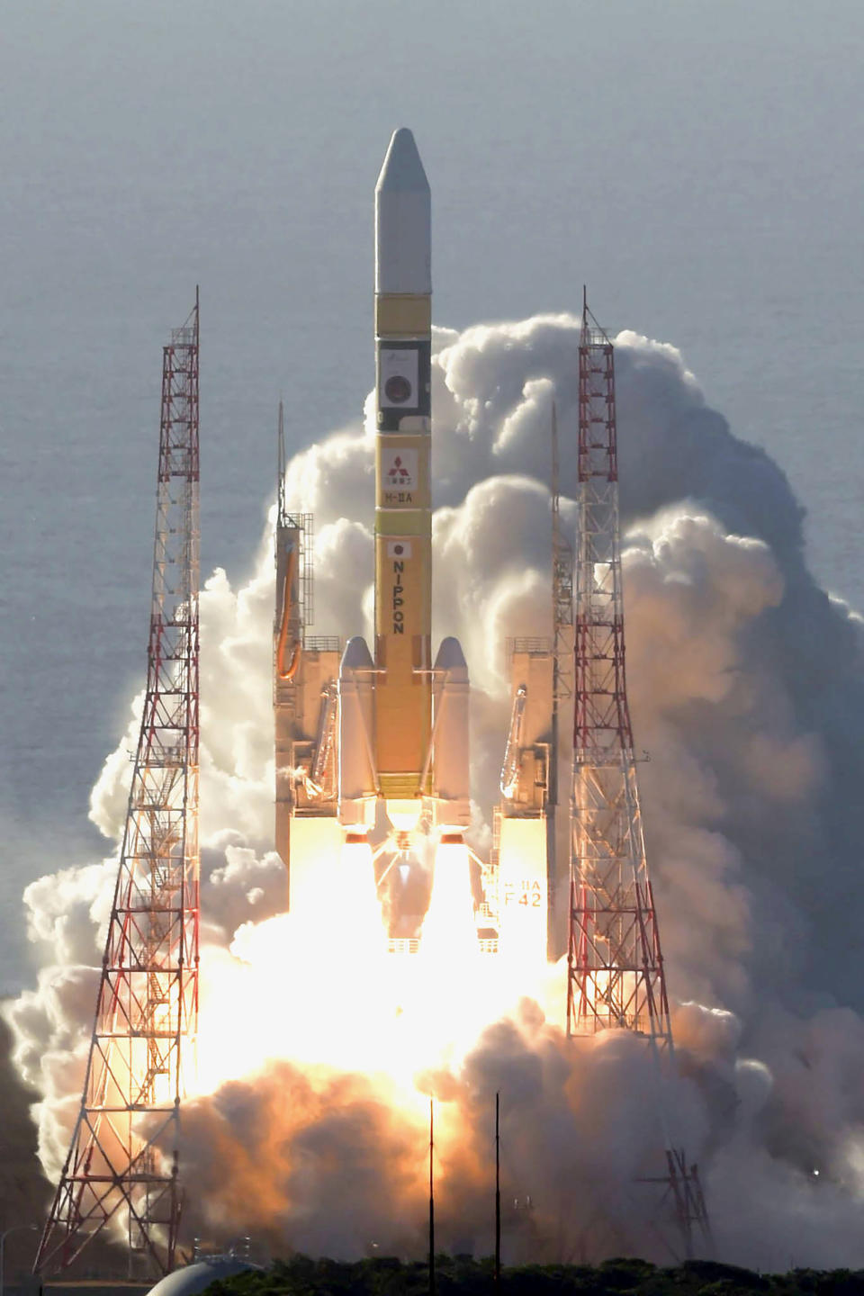 An H-IIA rocket with United Arab Emirates' Mars orbiter Hope lifts off from Tanegashima Space Center in Kagoshima, southern Japan Monday, July 20, 2020. A United Arab Emirates spacecraft rocketed away Monday on a seven-month journey to Mars, kicking off the Arab world’s first interplanetary mission. (Hiroki Yamauchi/Kyodo News via AP)