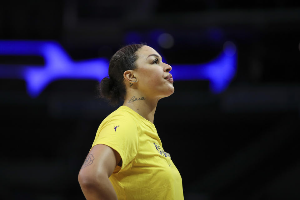 LOS ANGELES, CALIFORNIA - JUNE 11: Center Liz Cambage #1 of the Los Angeles Sparks looks on during warm ups before the game against the Las Vegas Aces at Crypto.com Arena on June 11, 2022 in Los Angeles, California. NOTE TO USER: User expressly acknowledges and agrees that, by downloading and or using this photograph, User is consenting to the terms and conditions of the Getty Images License Agreement. (Photo by Meg Oliphant/Getty Images)