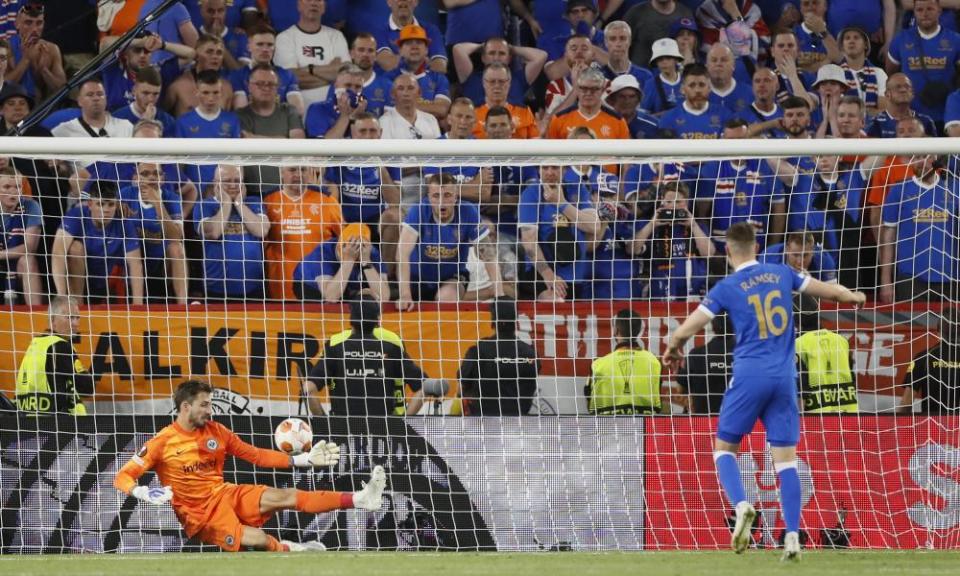 Kevin Trapp saves Aaron Ramsey’s penalty during the shootout