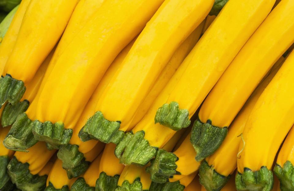 yellow squash in a basket