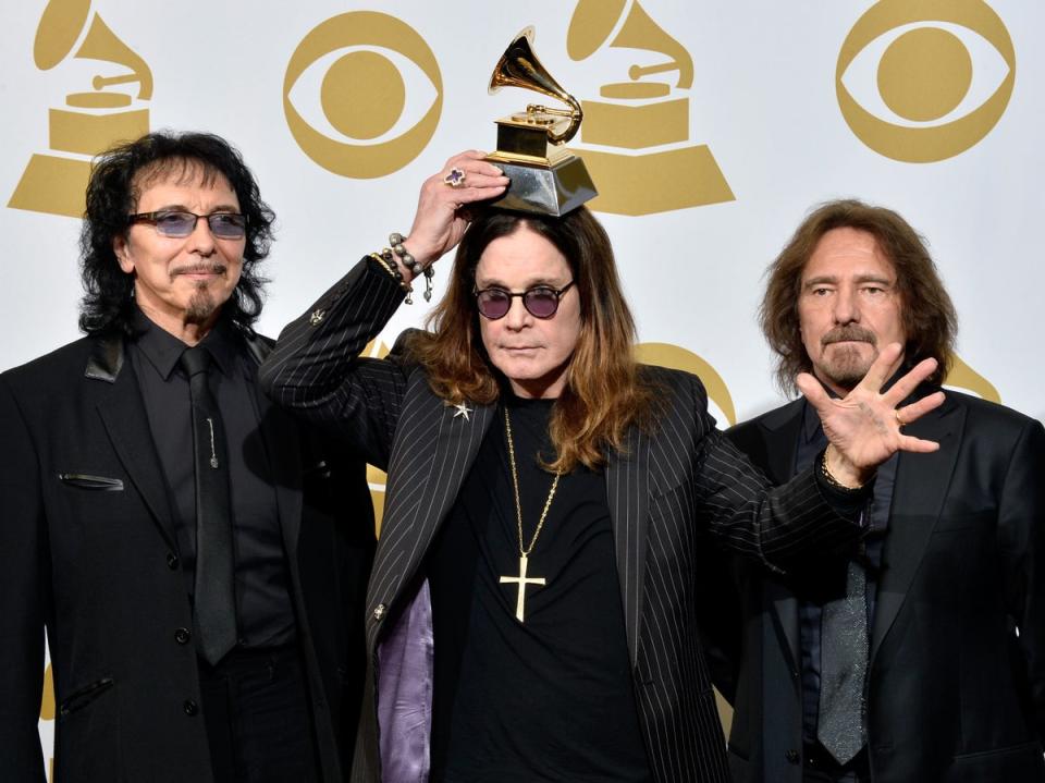 Black Sabbath: Tony Iommi, Osbourne and Geezer Butler with their Grammy for Best Metal Performance in 2014 (Getty)