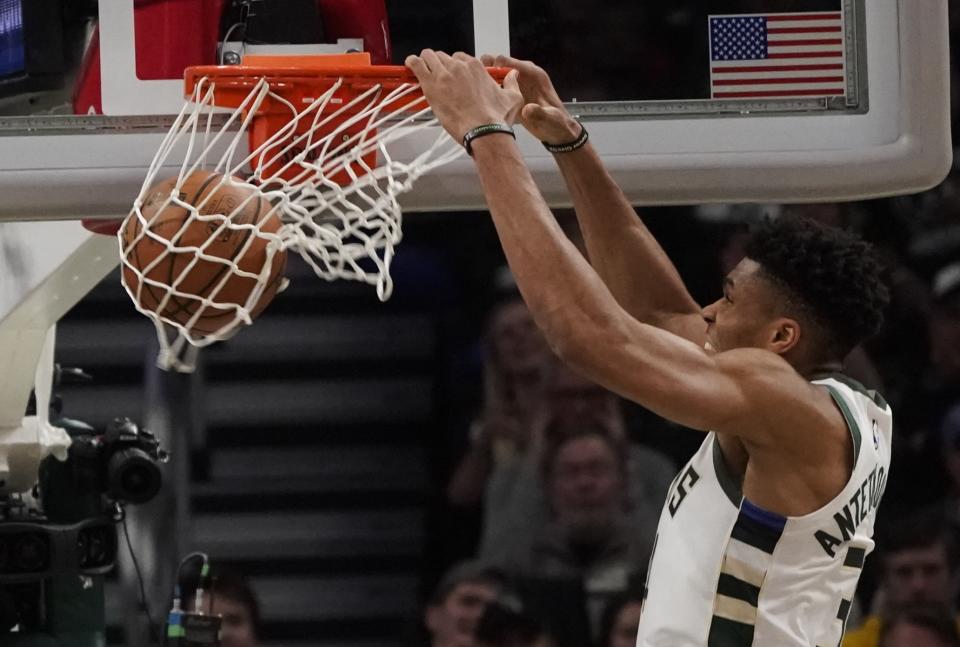 Milwaukee Bucks' Giannis Antetokounmpo dunks during the second half of Game 2 of the NBA Eastern Conference basketball playoff finals against the Toronto Raptors Friday, May 17, 2019, in Milwaukee. The Bucks won 125-103 to take a 2-0 lead in the series. (AP Photo/Morry Gash)