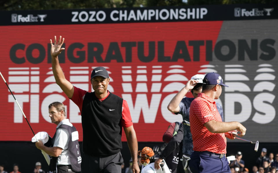 FILE - In this Oct. 28, 2019, file photo, Tiger Woods celebrates after winning the Zozo Championship golf tournament at the Accordia Golf Narashino country club in Inzai, east of Tokyo, Japan. Woods is the defending champion at a course where he has won five times. The Zozo Championship is the second Asia-based event to move to the United States this year because of the COVID-19 pandemic. (AP Photo/Lee Jin-man, File)