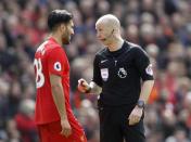 Britain Soccer Football - Liverpool v Everton - Premier League - Anfield - 1/4/17 Liverpool's Emre Can speaks to referee Anthony Taylor Action Images via Reuters / Carl Recine Livepic