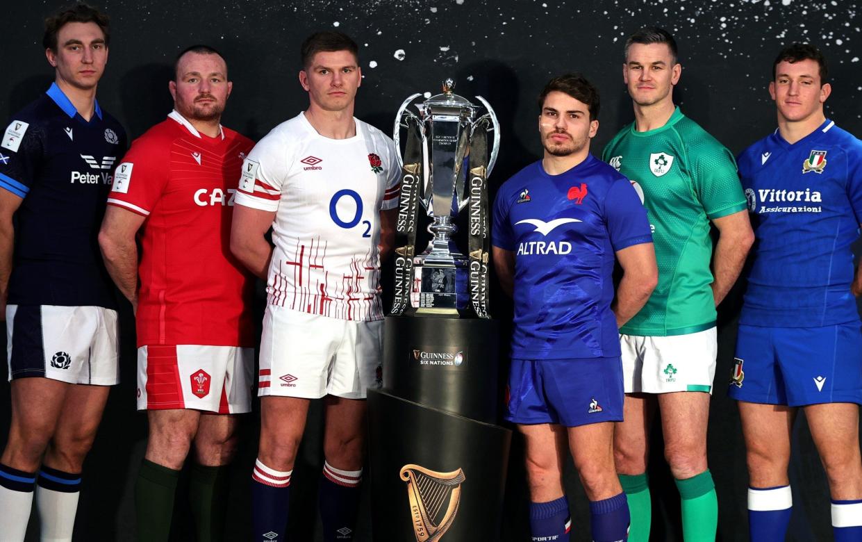 Jamie Ritchie, Ken Owens, Owen Farrell, Antoine Dupont, Johnny Sexton and Michele Lamaro pose alongside the Six Nations trophy - David Rogers/Getty Images
