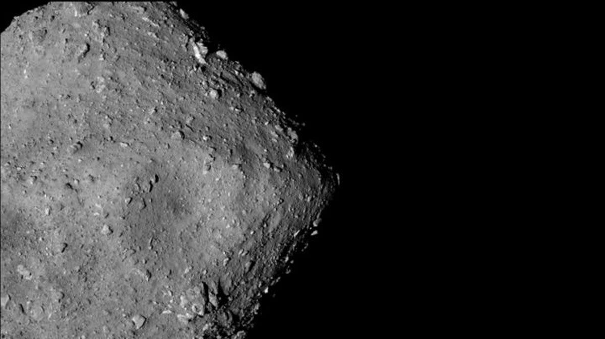 Japan’s Hayabusa2 spacecraft snapped pictures of the asteroid Ryugu while flying alongside it two years ago. The spacecraft later returned rock samples from the asteroid to Earth. (Jaxa)