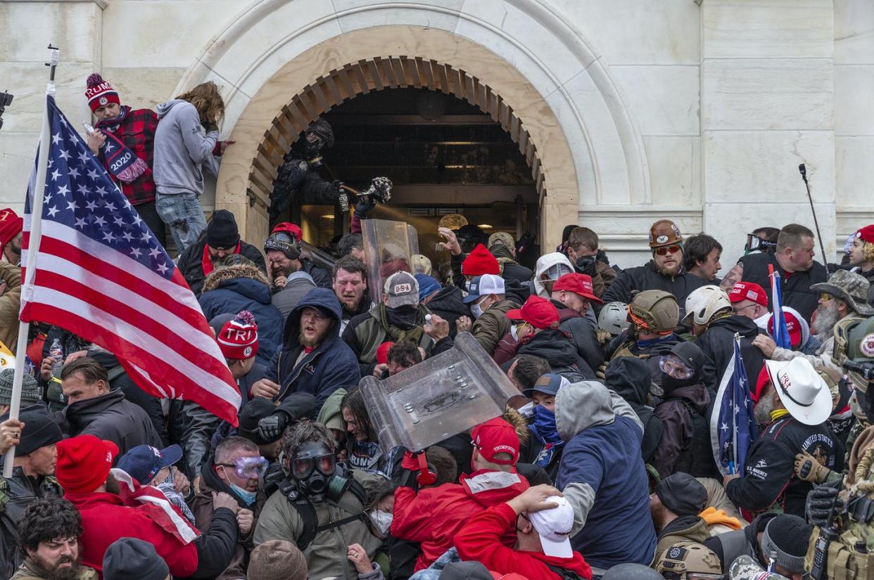 <span class="caption">Rioters are tear-gassed as they storm the U.S. Capitol on Jan. 6, 2021. </span> <span class="attribution"><a class="link " href="https://www.gettyimages.com/detail/news-photo/police-use-tear-gas-around-capitol-building-where-pro-trump-news-photo/1230464979?adppopup=true" rel="nofollow noopener" target="_blank" data-ylk="slk:Lev Radin/Pacific Press/LightRocket via Getty Images;elm:context_link;itc:0;sec:content-canvas">Lev Radin/Pacific Press/LightRocket via Getty Images</a></span>