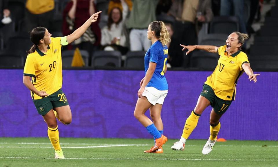 Sam Kerr celebrates with Kyah Simon after scoring the Matildas’ second.