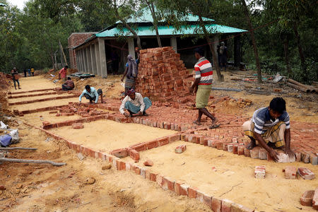 Workers build a Rohingya repatriation centre in Gunndum near Cox's Bazar, Bangladesh, November 14, 2018. REUTERS/Mohammad Ponir Hossain