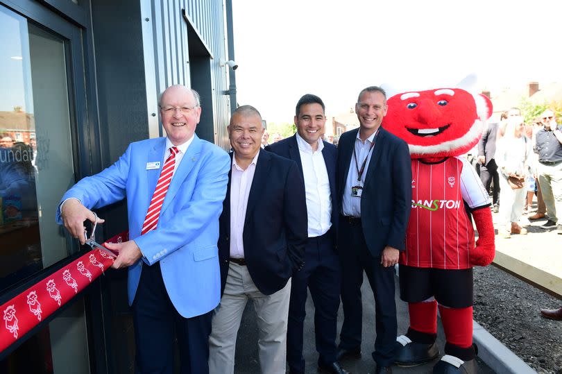 Richard Wills, president of Lincolnshire Co-op, officially opens the new Co-op Community Hub at the LNER Stadium. He is joined by (L-R) chair of the Lincolnshire Football Association Professor Jonathan Van-Tam, Lincoln City chief executive Liam Scully, Lincoln City Foundation chief executive Martin Hickerton and Poacher The Imp