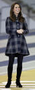 <p>The Duchess spent a day in Scotland dressed in a tartan coat by British label, Moloh. She also wore her trust Aquatalia heeled boots and carried a black suede clutch. </p><p><i>[Photo: PA]</i></p>