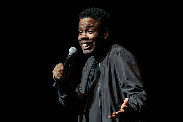 Chris Rock performs onstage.