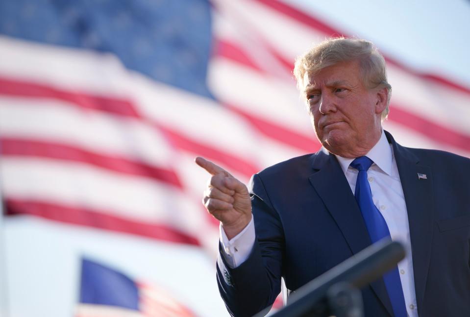 Former President Donald Trump addresses the crowd during a rally in Delaware, Ohio on Saturday, April 22, 2022.