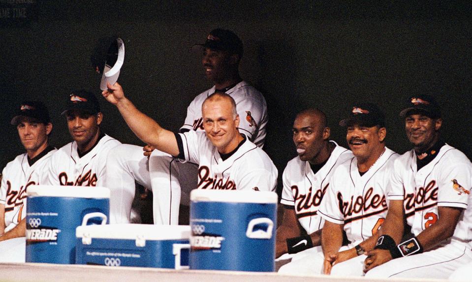 Cal Ripken Jr. tips his cap to the fans at Camden Yards on the night his consecutive games played streak came to an end. (Getty)