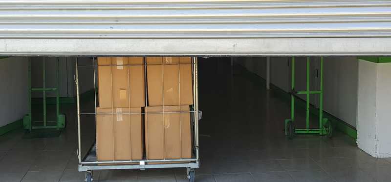 A storage unit with the door halfway up.