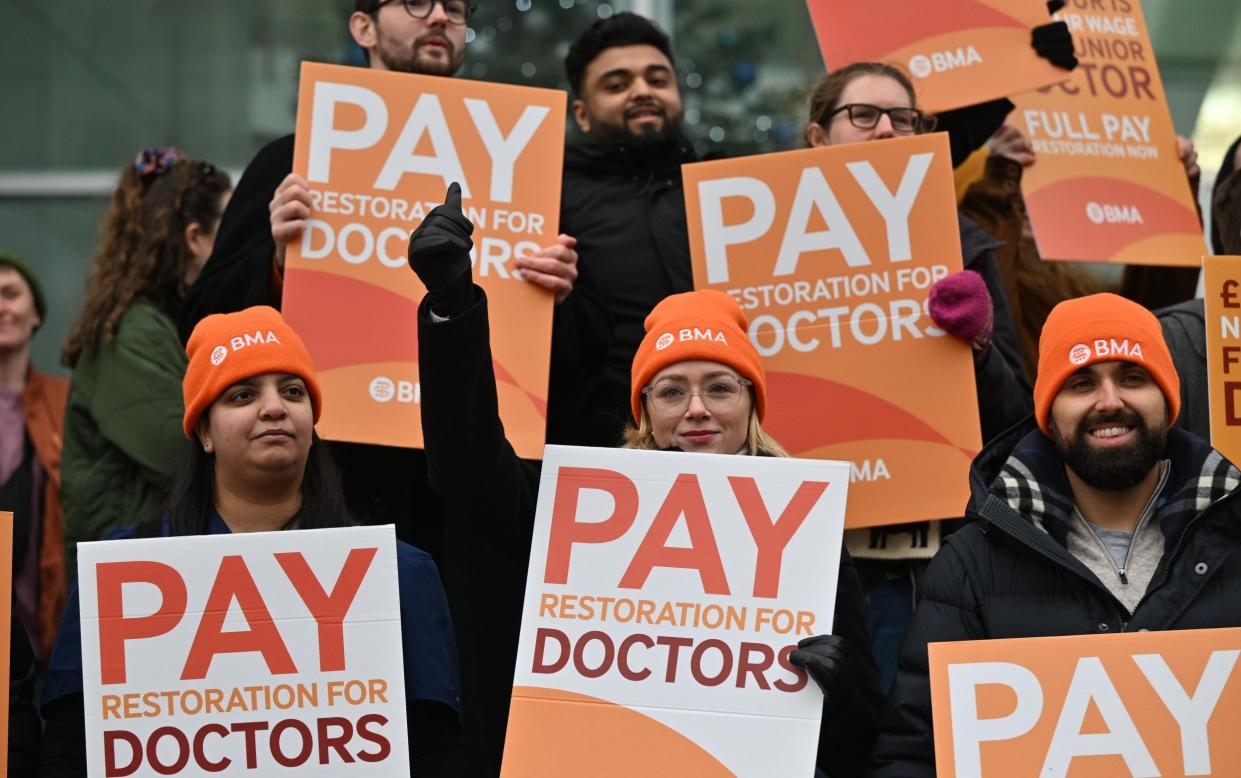 Junior doctors on the picket line at University College Hospital London in December. Two-thirds of junior doctors voted to accept the pay rise deal