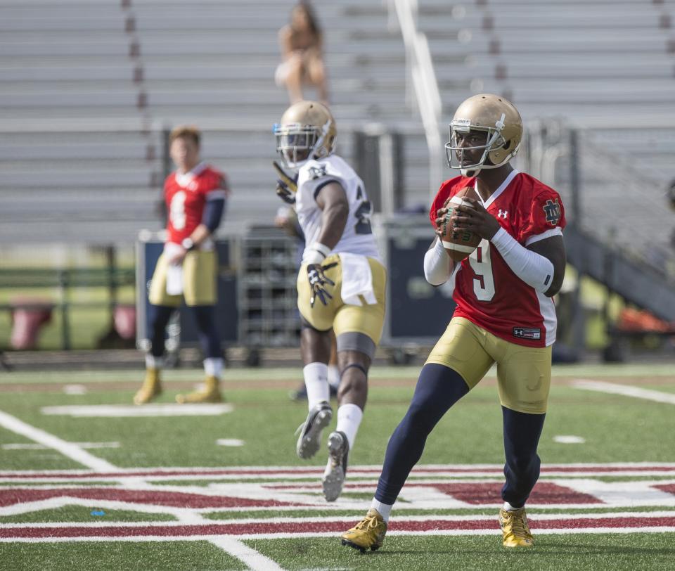 Notre Dame quarterback Malik Zaire gets ready to throw a pass as the Notre Dame football team practices at Culver Military Academy in Culver, Indiana on Saturday, Aug. 6, 2016. (Santiago Flores/The South Bend Tribune via AP)