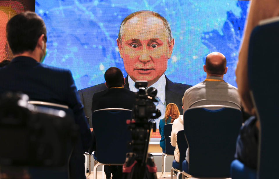 Russian President Vladimir Putin speaks via video call during a news conference in Moscow, Russia, Thursday, Dec. 17, 2020. This year, Putin attended his annual news conference online due to the coronavirus pandemic. (AP Photo/Alexander Zemlianichenko)