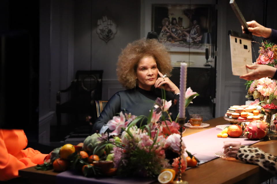 Michaela Angela Davis sitting at table