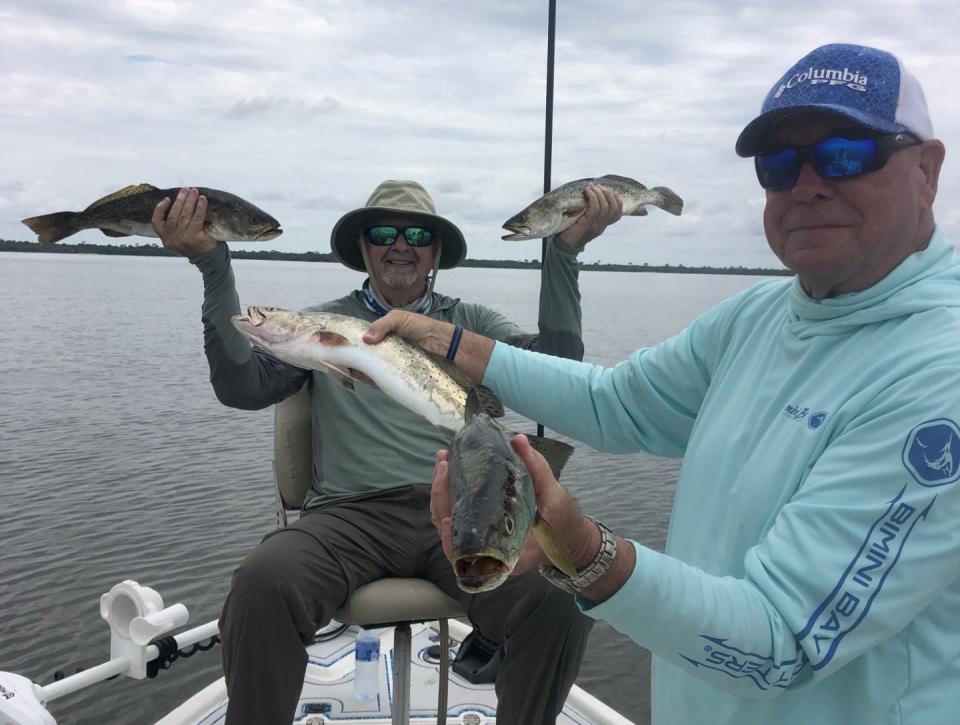 Danny and Dennis Fleash went fishing with Art Mowery in Southeast Volusia and ended up two-fisting trout.