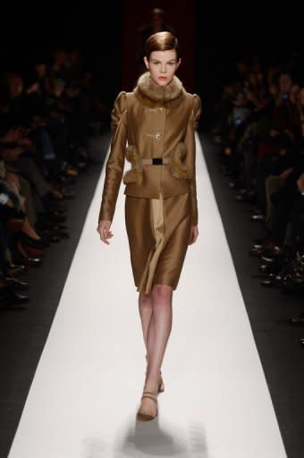 A model walks the runway at the Carolina Herrera fall 2013 fashion show, on February 11, 2013, in New York. At 74, Herrera is one of the grande dames of the New York fashion world