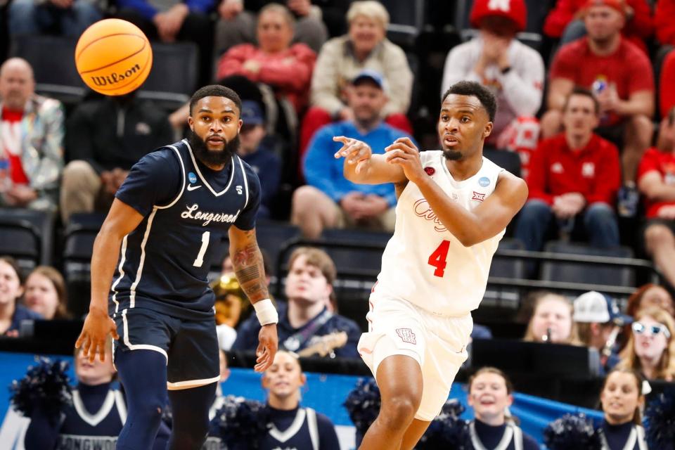 Houston's L.J. Cryer (4) passes the ball during the first round game between University of Houston and Longwood University in the 2024 NCAA Tournament at FedExForum in Memphis, Tenn., on Friday, March 22, 2024.