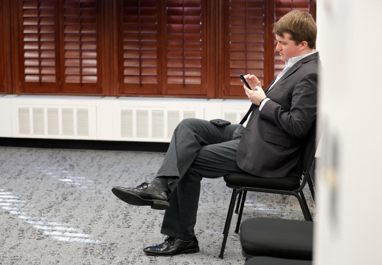 General counsel with the Oklahoma State Department of Education, Bryan Cleveland, sits at a public hearing on Friday to allow people to express their opinion about proposed rules changes for the state Education Department.