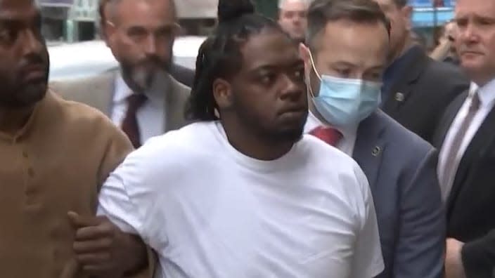 Andrew Abdullah, the 25-year-old man accused of randomly killing another NYC subway passenger on Sunday, is shown being brought in after his arrest on Tuesday. (Photo: Screenshot/NBCNewYork.com)