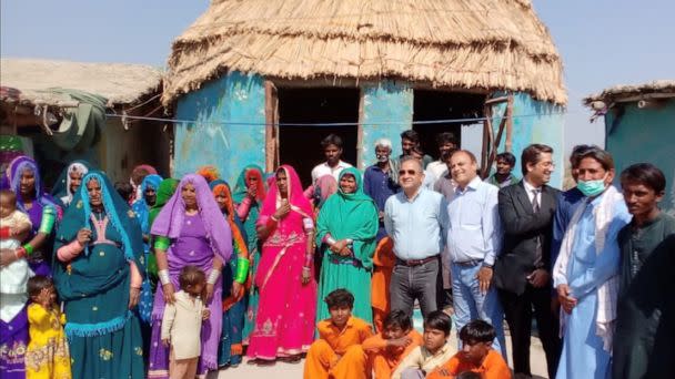 PHOTO: Bank of Punjab Officials visiting Pono Village to provide loans to women’s committees for 100 family units on July 16. (Yasmeen Lari)