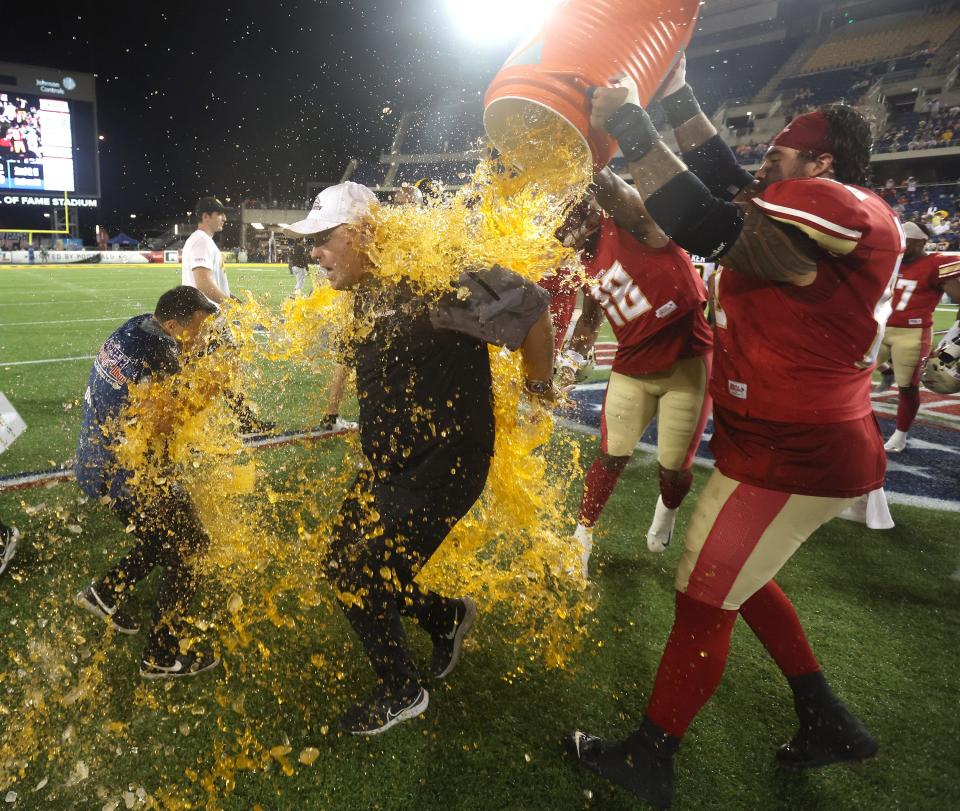 Birmingham Stallions head coach Skip Holtz gets Gatorade dumped on him by his players after beating the Pittsburgh Maulers for the USFL championship Saturday in Canton.