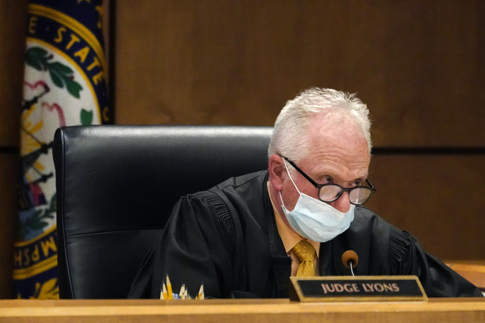 Judge William Lyons speaks, Monday, April 12, 2021, in Manchester, N.H. District Court, during a video bail hearing for Gordon Searles in connection with sexual abuse allegations at the Sununu Youth Services Center, a state-run youth detention center. (AP Photo/Elise Amendola, Pool)