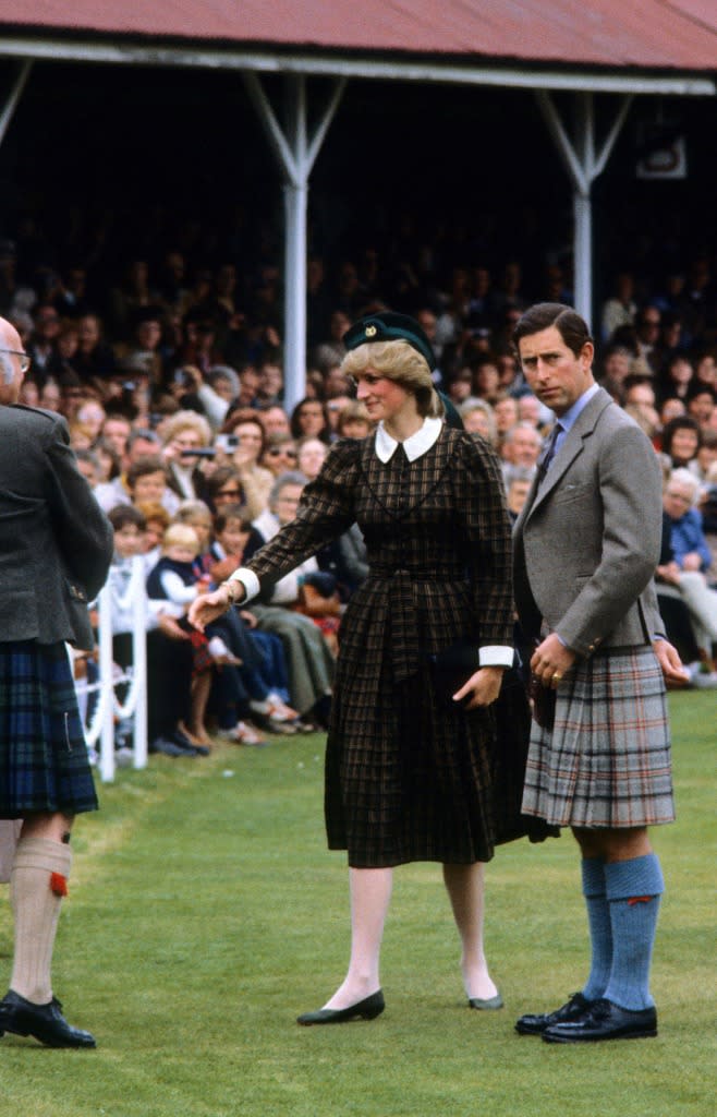 The princess in her brown tartan dress with Peter Pan collar. (Photo: Getty)