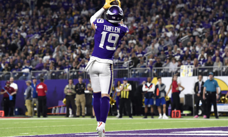 Adam Thielen catching a touchdown pass.