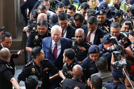 Former Malaysian prime minister Najib Razak arrives in court in Kuala Lumpur, Malaysia July 4, 2018. REUTERS/Lai Seng Sin