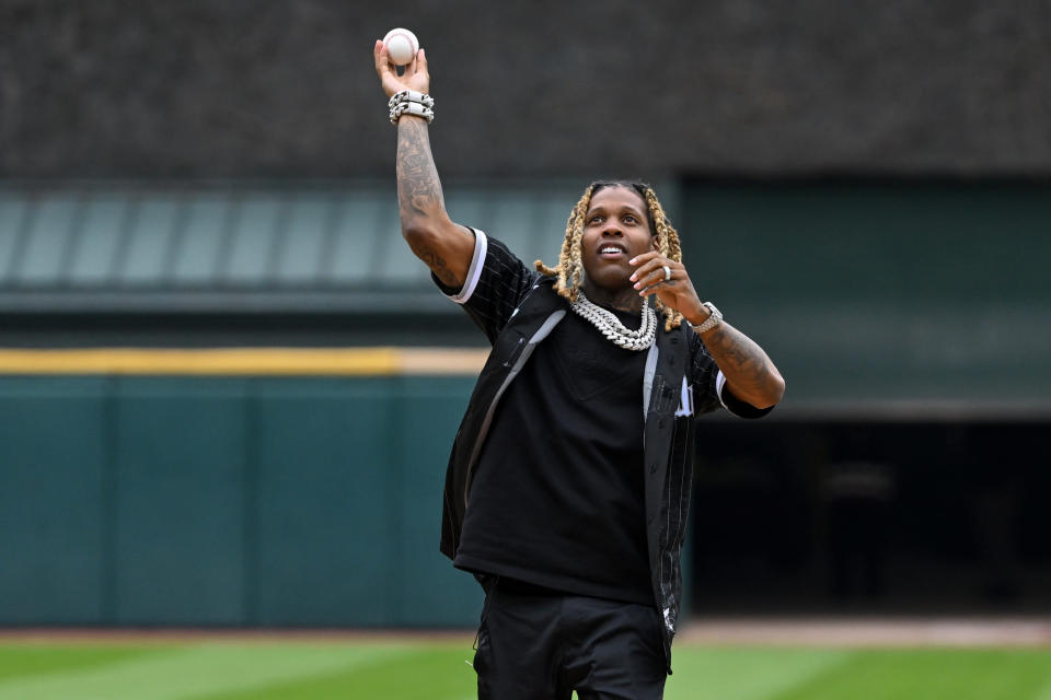 Lil Durk, throws a ceremonial first pitch before the game between the Chicago White Sox and the Los Angeles Angels at Guaranteed Rate Field on May 2, 2022 in Chicago. - Credit: Quinn Harris/Getty Images