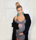 <p>While pregnant with her first child, Kardashian wore stark white polish that popped against her sparkling sequined dress. (Photo: Khloékardashian via Instagram) </p>