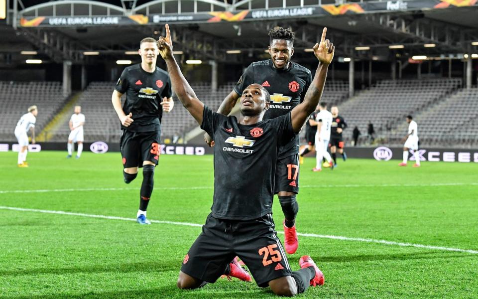 Manchester United's Odion Ighalo celebrates after scoring the opening goal during the Europa League round of 16 first leg soccer match between Linzer ASK -  AP